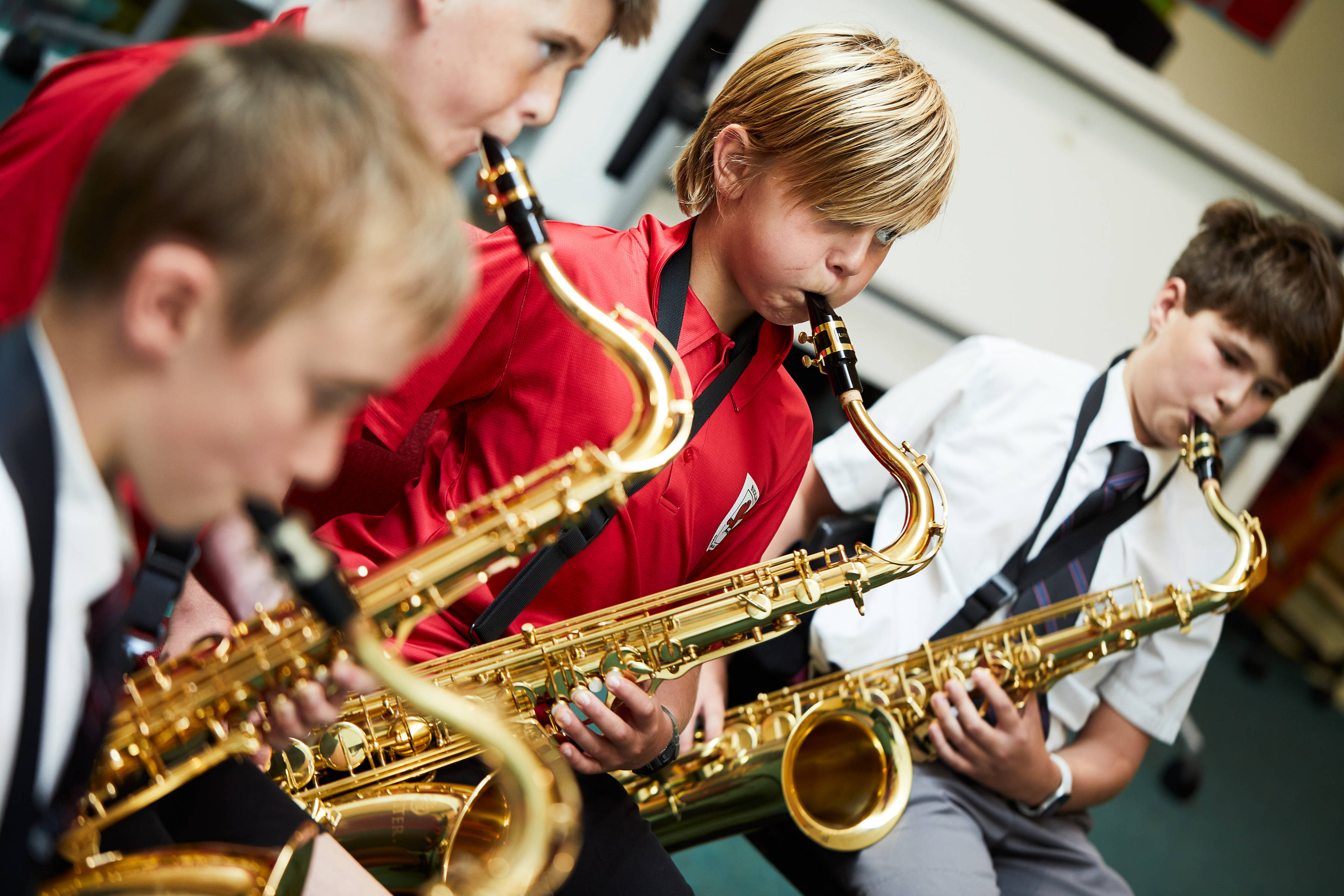Junior School students playing saxophones. Photo: Alastair Bett.